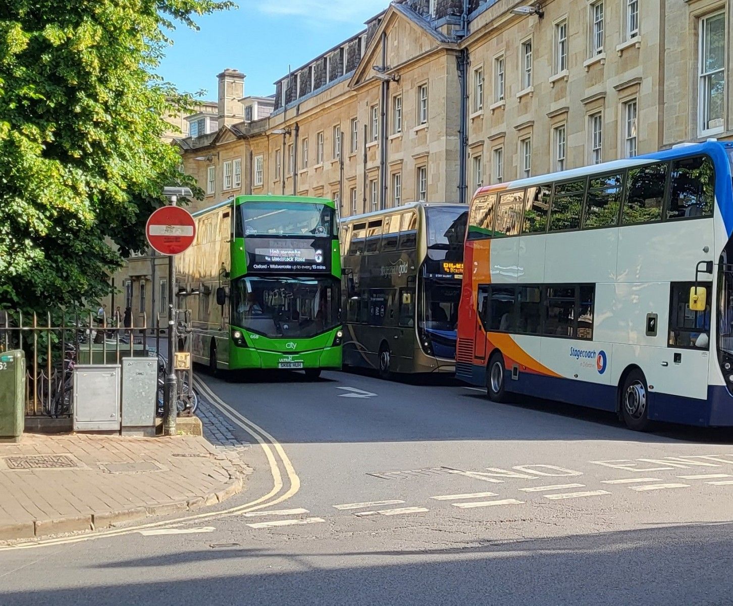 Double decker buses on Magdalen Street East, central Oxford