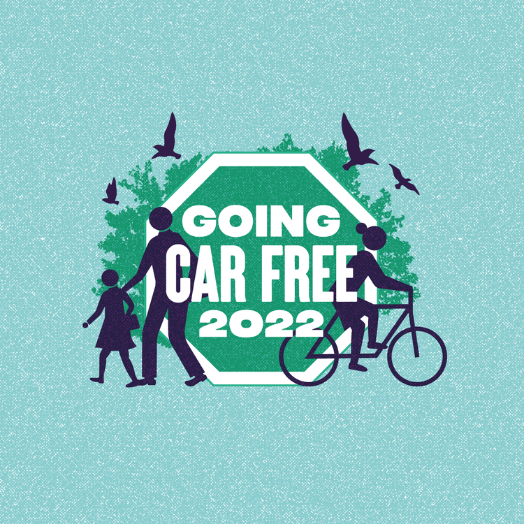Silhouette of an adult and child walking and a person cycling against a "Going Car Free 2022" logo