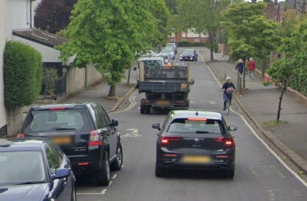 A cyclist using a minor road in Headington, Oxford